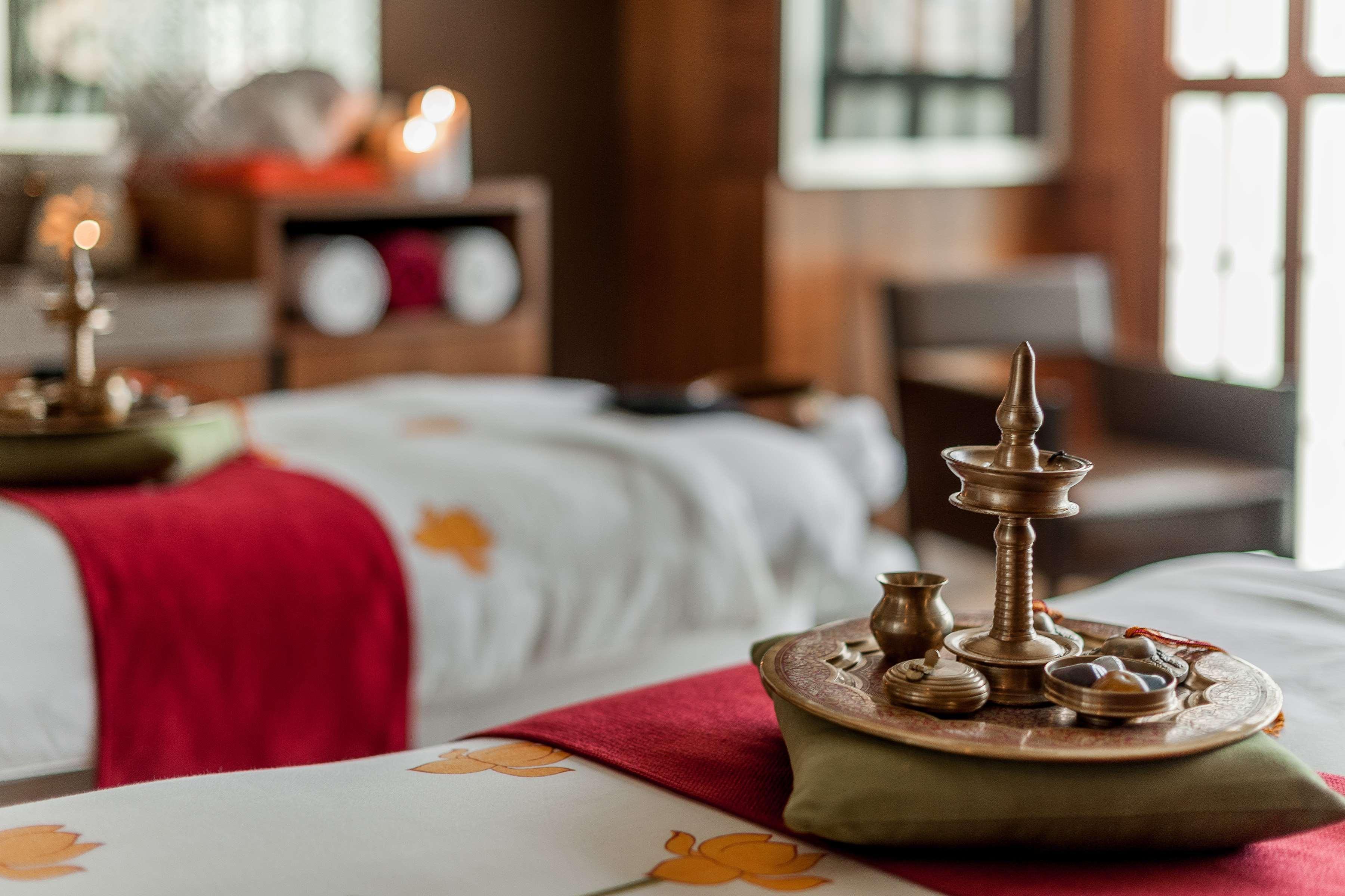 Hyatt Ahmedabad Hotell Exteriör bild A traditional brass diya
